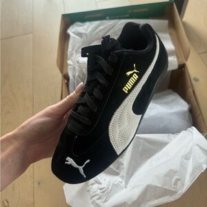 Puma Black and White Shoes with Gold Details
